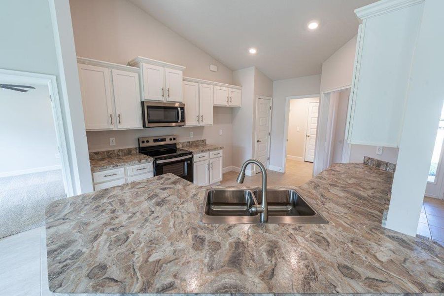 Furnished interior view inside a new home in Bayshore, Port St. Lucie (Image 3). Furnished interior view inside a new home in Bayshore, Port St. Lucie (Image 3).