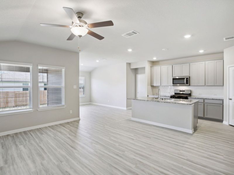 Have a great view of the living and dining areas from the kitchen.