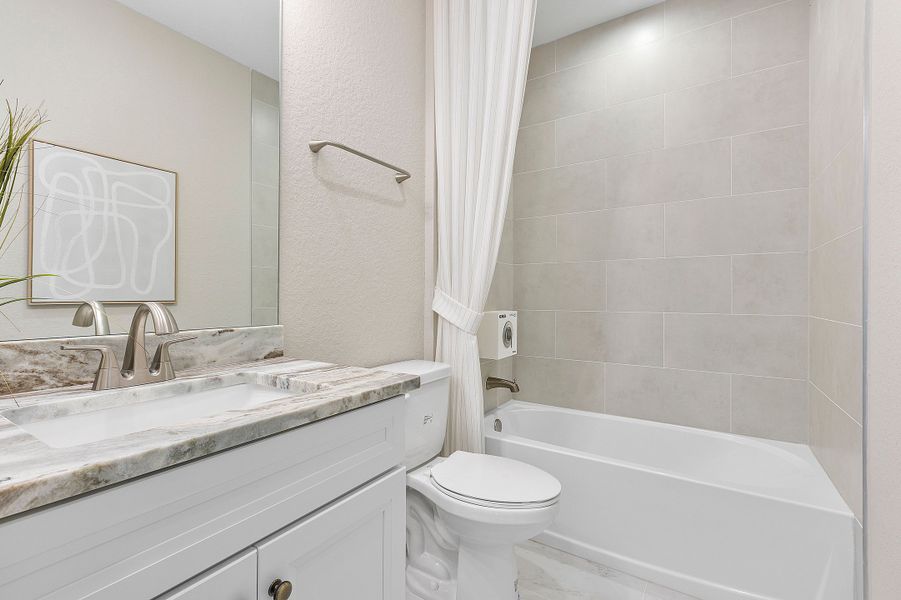 Representative furnished interior of a home built from the Charlotte by William Ryan Homes in The Sanctuary – Royal Collection, Punta Gorda (Image 48). Representative furnished interior of a home built from the Charlotte by William Ryan Homes in The Sanctuary – Royal Collection, Punta Gorda (Image 48).