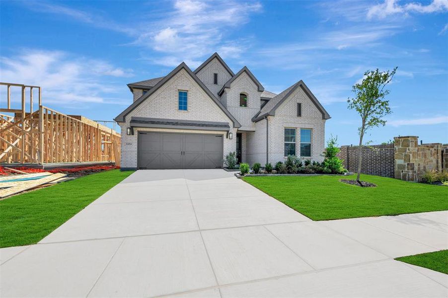 Front exterior of a new home in Aster Park, McKinney, TX, highlighting curb appeal (Image 21).
