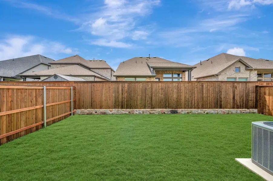 Exterior details and patio area of a home in Creekshaw – Gardens, Royse City (Image 4). Exterior details and patio area of a home in Creekshaw – Gardens, Royse City (Image 4).