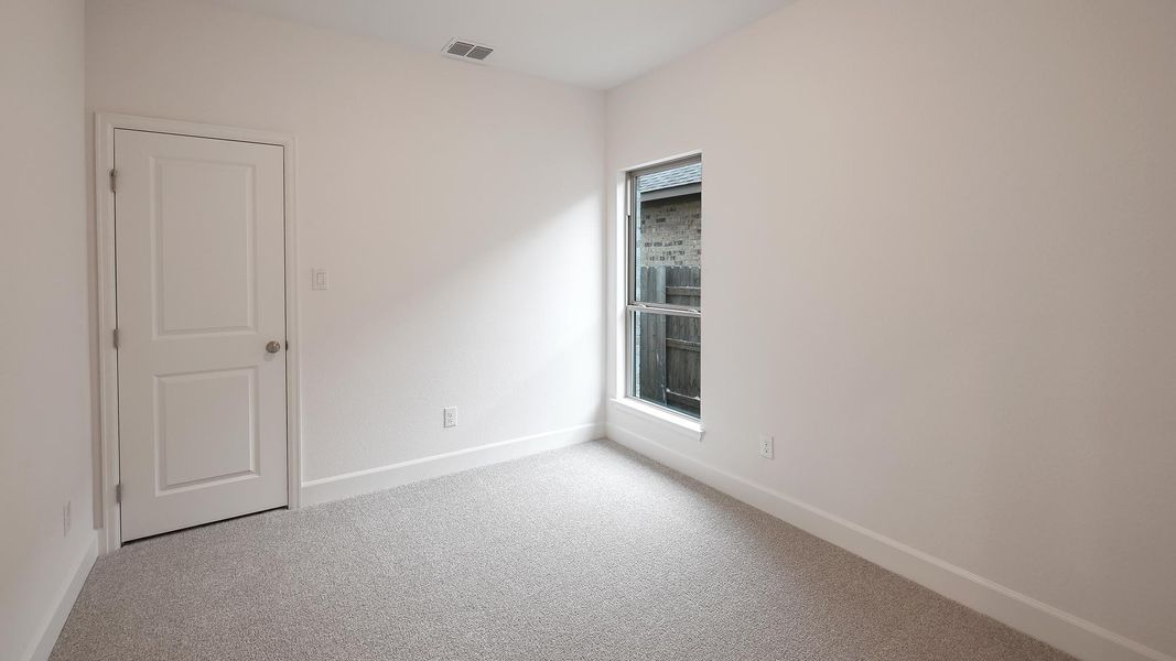 Spacious, unfurnished interior of a new home in Crosswinds, Kyle (Image 24).