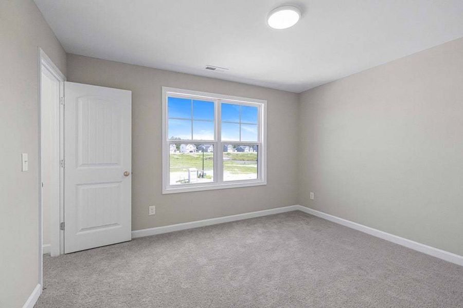 Representative unfurnished interior of a home built from the Pamlico by Caviness & Cates Communities in Bartlett Manor, Youngsville (Image 72).