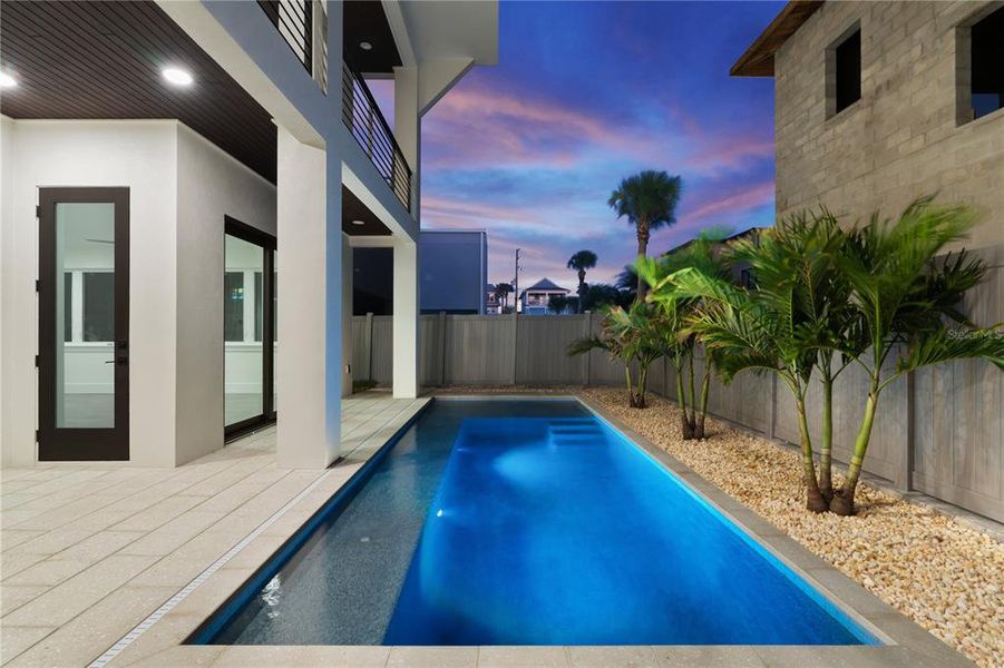 Exterior details and patio area of a home in , New Smyrna Beach (Image 46).
