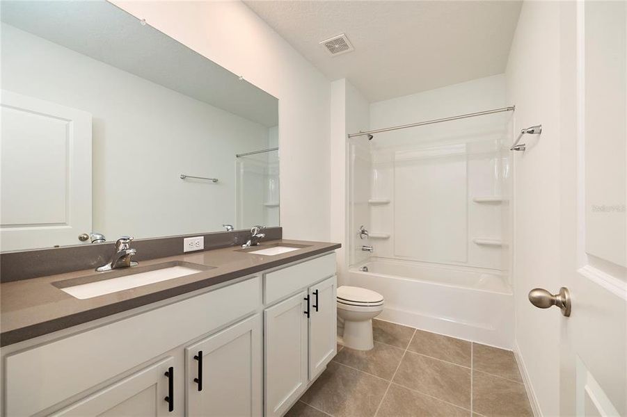 Furnished interior view inside a new home in Westgate at Avalon Park, Wesley Chapel (Image 34).