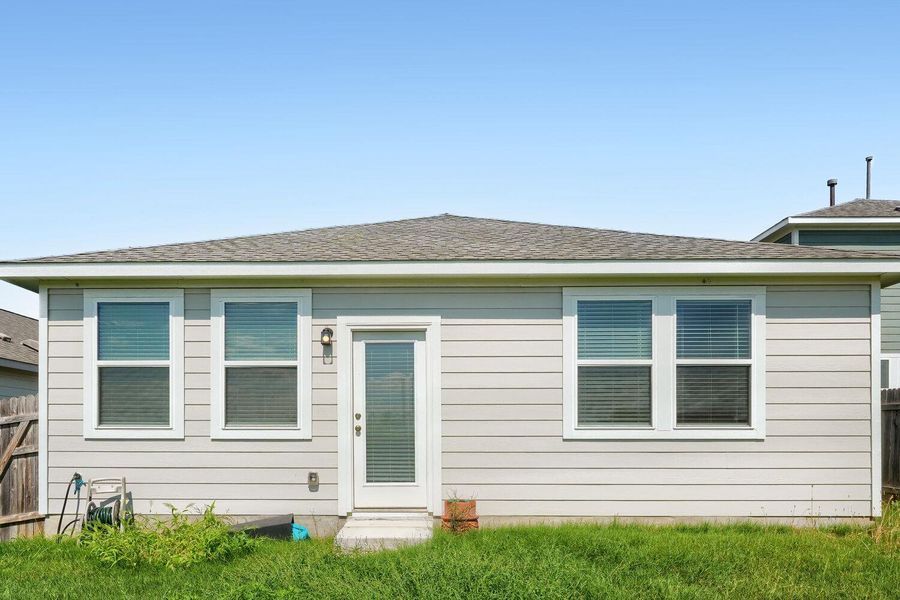 Exterior details and patio area of a home in Stallion Run, Buda (Image 3).