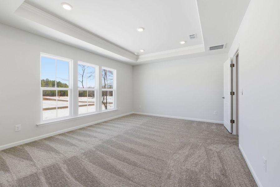 Spacious, unfurnished interior of a new home in Poets Walk, Whitsett (Image 19).
