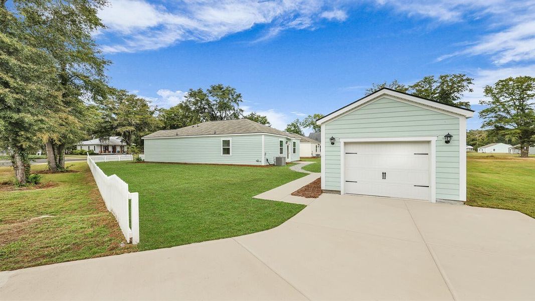 Front exterior of a new home in North Shore, Summerton, SC, highlighting curb appeal (Image 19).