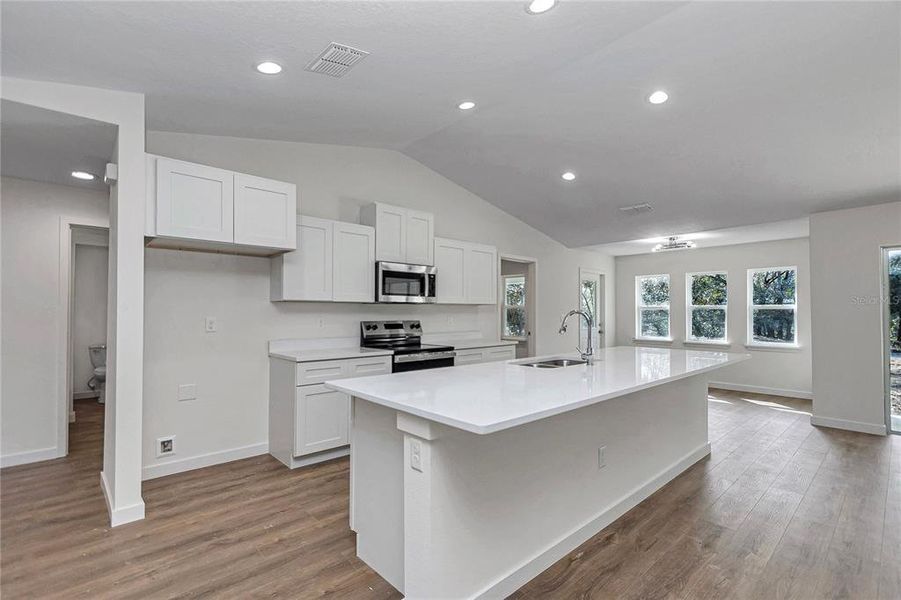Furnished interior view inside a new home in , Dunnellon (Image 6).