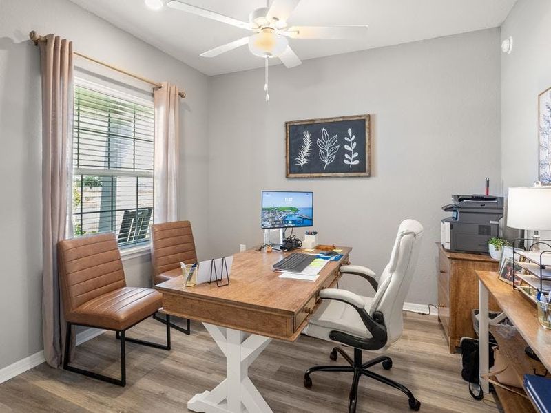 A flexible den area makes for a great home office and you can choose to add french doors for additional privacy - Summerlyn ll home plan by Highland Homes