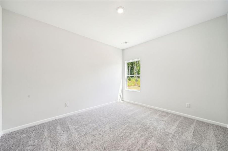 Spacious, unfurnished interior of a new home in Stephen's Landing, Loganville (Image 29).