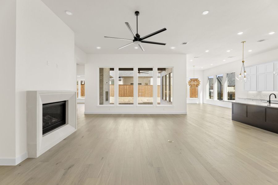 Representative unfurnished interior of a home built from the 5551 by Tradition Homes in Windsong Ranch, Prosper (Image 21).