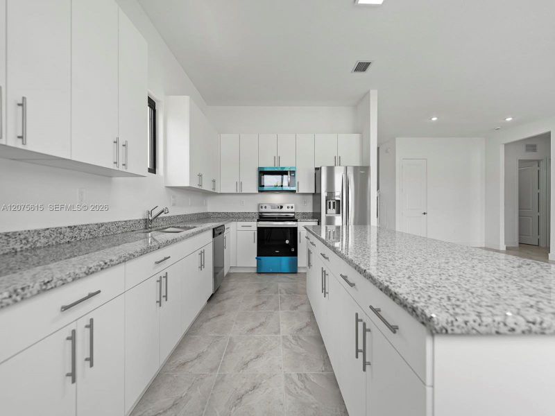 Furnished interior view inside a new home in , Homestead (Image 6). Furnished interior view inside a new home in , Homestead (Image 6).
