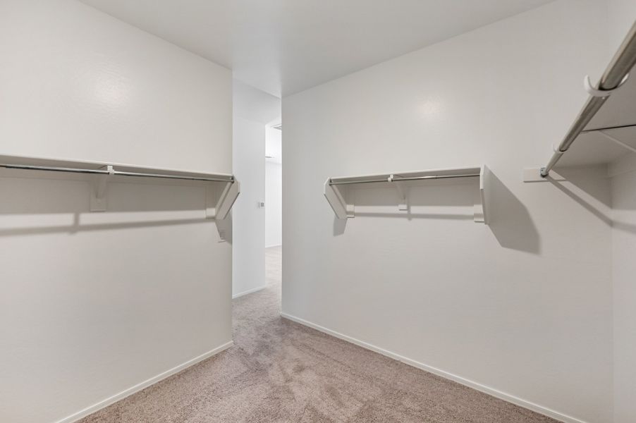 Primary walk in closet. Finishes and options may . Finishes and options may vary by community
