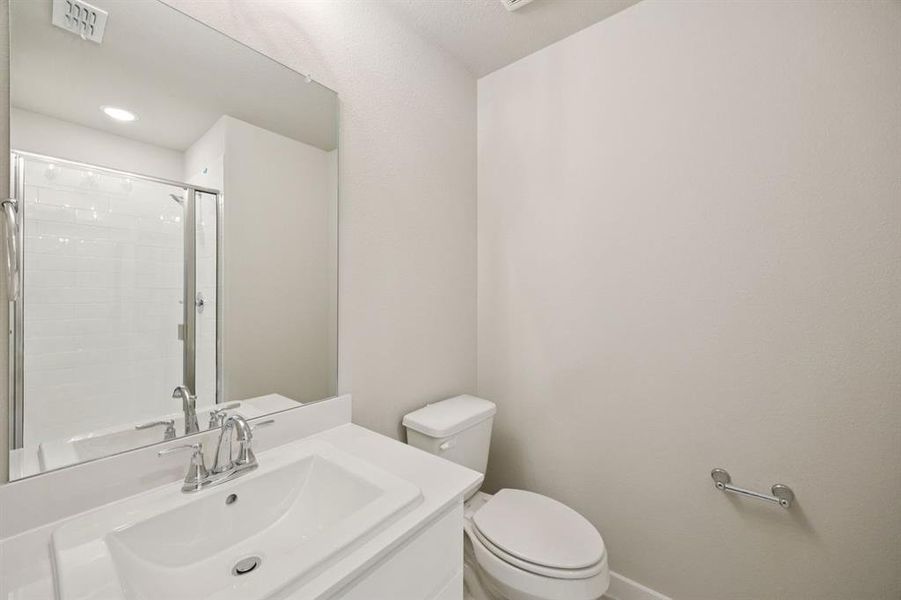 Bathroom in the Oscar home plan by Trophy Signature Homes – REPRESENTATIVE PHOTO Bathroom in the Oscar home plan by Trophy Signature Homes – REPRESENTATIVE PHOTO