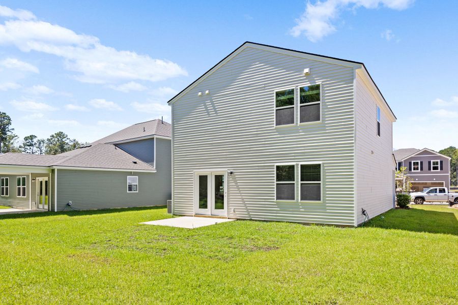 Front exterior of a new home in Bradford Pointe, Summerville, SC, highlighting curb appeal (Image 2).