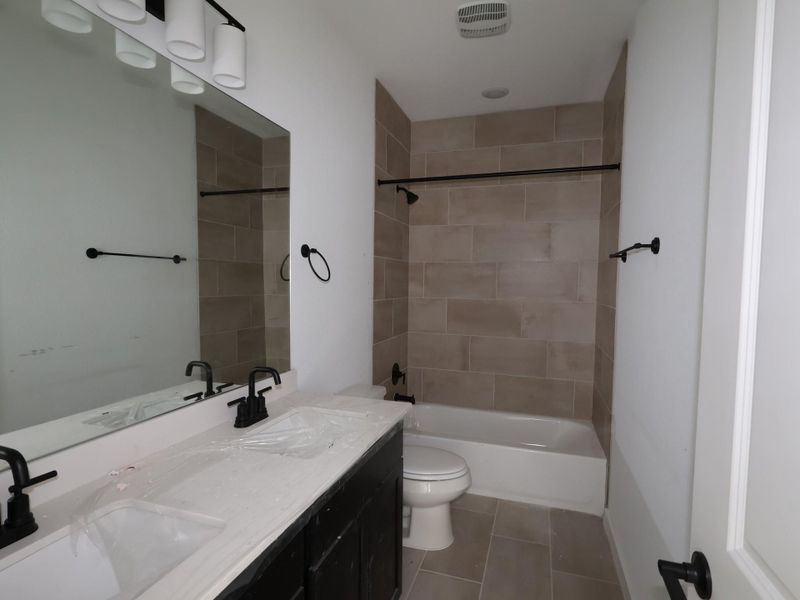 Furnished interior view inside a new home in Cedar Brook, Leander (Image 5).