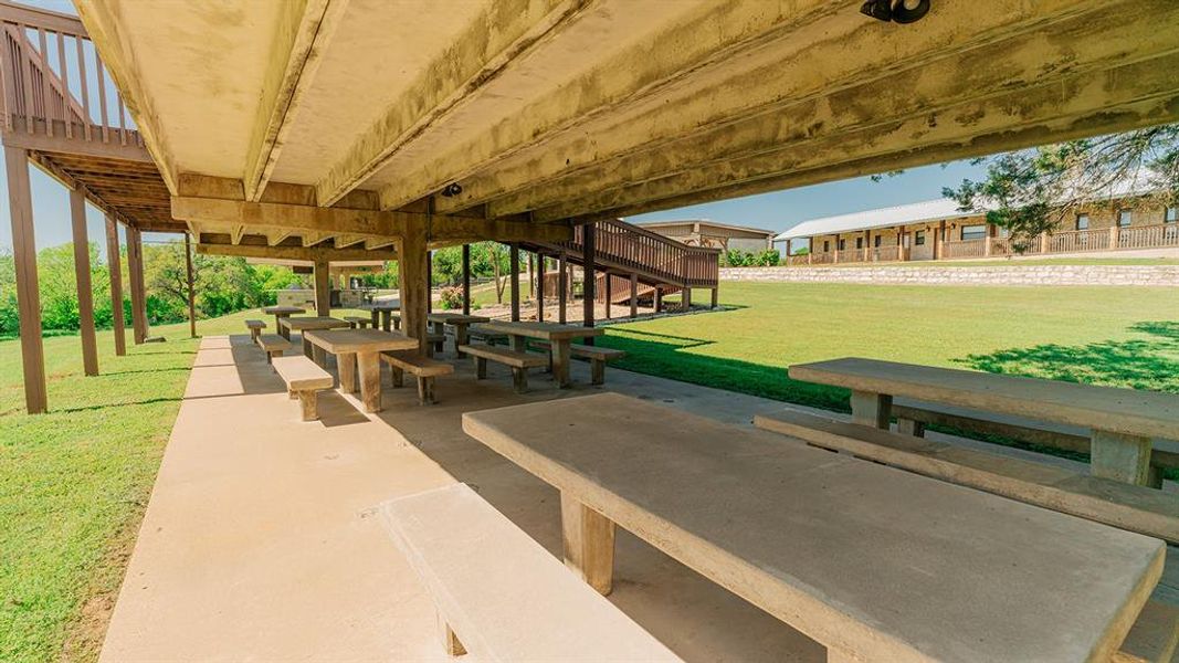 Surrounding community featuring a lawn and a patio