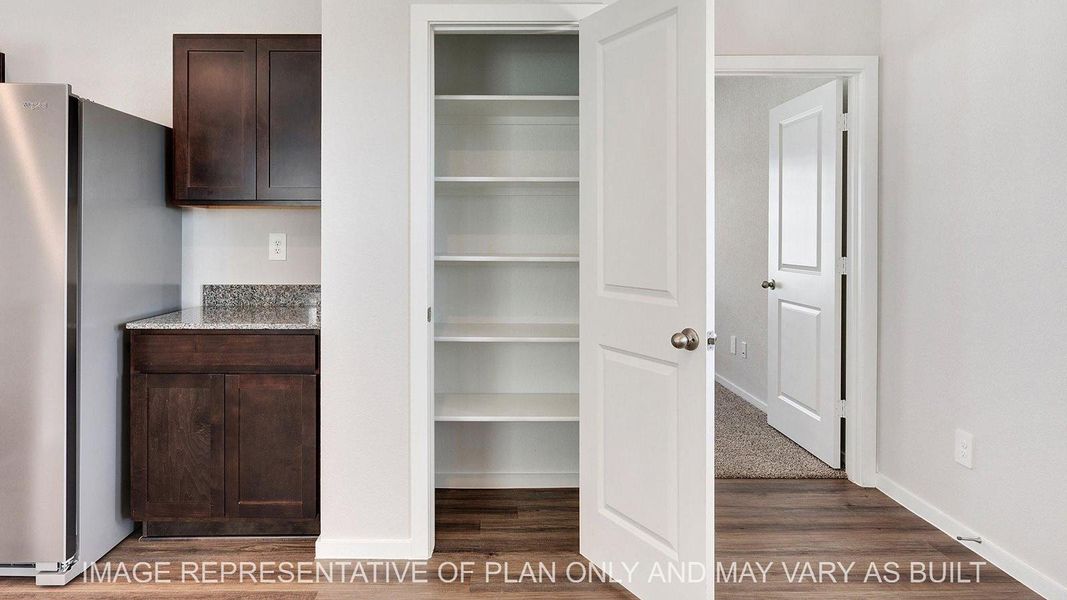 Furnished interior view inside a new home in Midtown Reserve, College Station (Image 6).