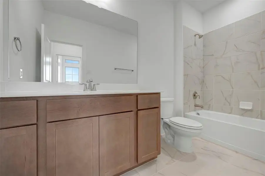 Furnished interior view inside a new home in Lily Creek at Sutton Fields, Aubrey (Image 6).