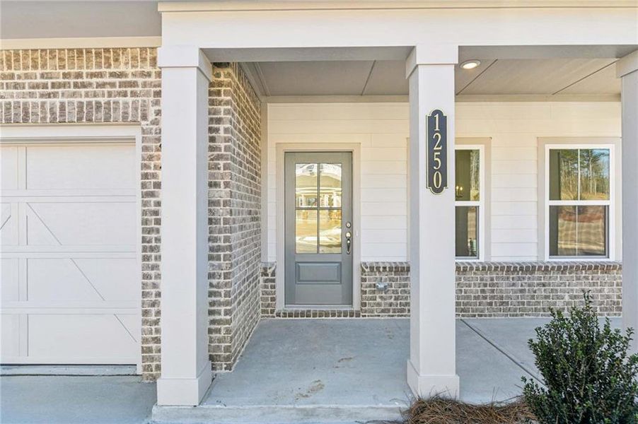 Exterior details and patio area of a home in Arbors at Richland Creek, Buford (Image 18). Exterior details and patio area of a home in Arbors at Richland Creek, Buford (Image 18).