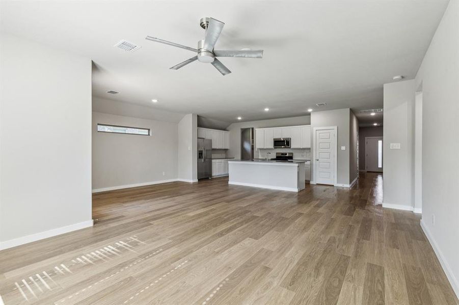 Open Floor Plan in the Heisman home plan by Trophy Signature Homes – REPRESENTATIVE PHOTO Open Floor Plan in the Heisman home plan by Trophy Signature Homes – REPRESENTATIVE PHOTO