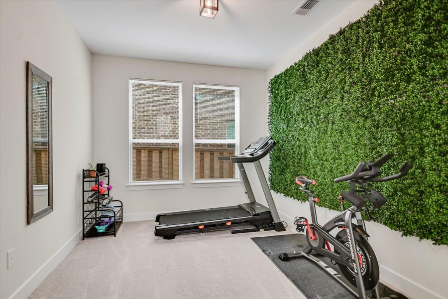 Home office/study currently being used as exercise room