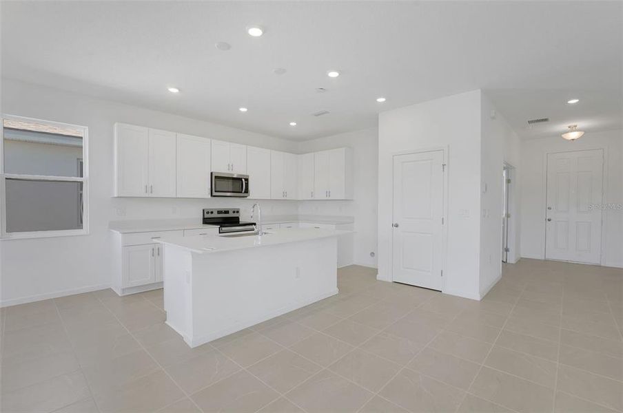 Furnished interior view inside a new home in Willowbrook North, Winter Haven (Image 14).