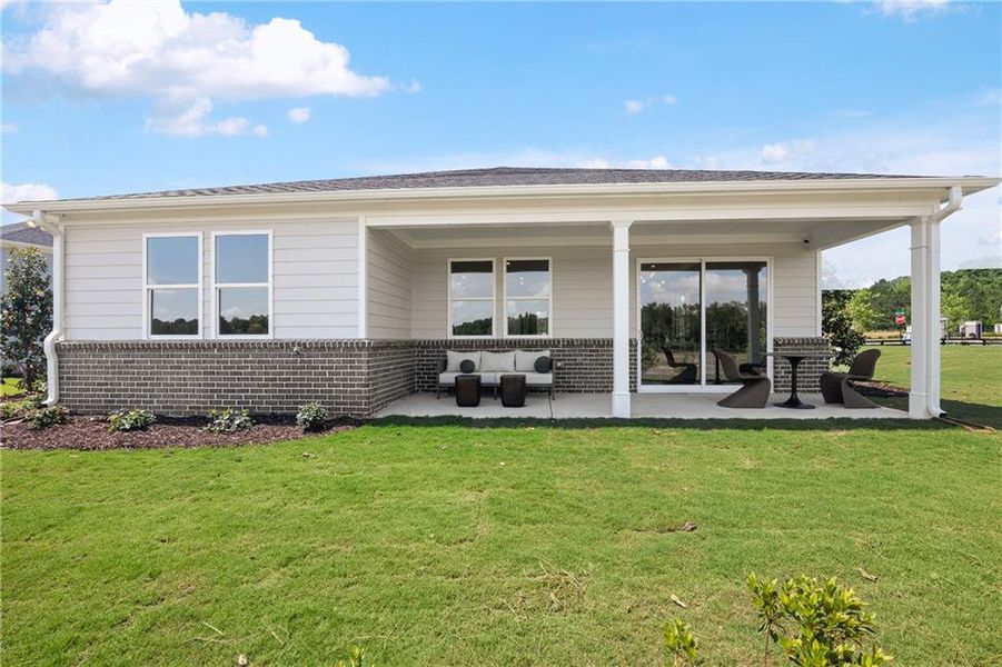 Exterior details and patio area of a home in Overland, Locust Grove (Image 2).