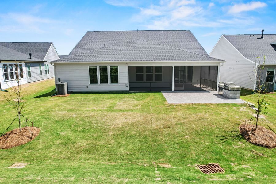 Exterior details and patio area of a home in Carolina Riverside, Belmont (Image 39).