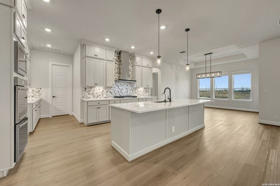 Furnished interior view inside a new home in Megans Landing – Half-Acre Homesites, Castroville (Image 9).