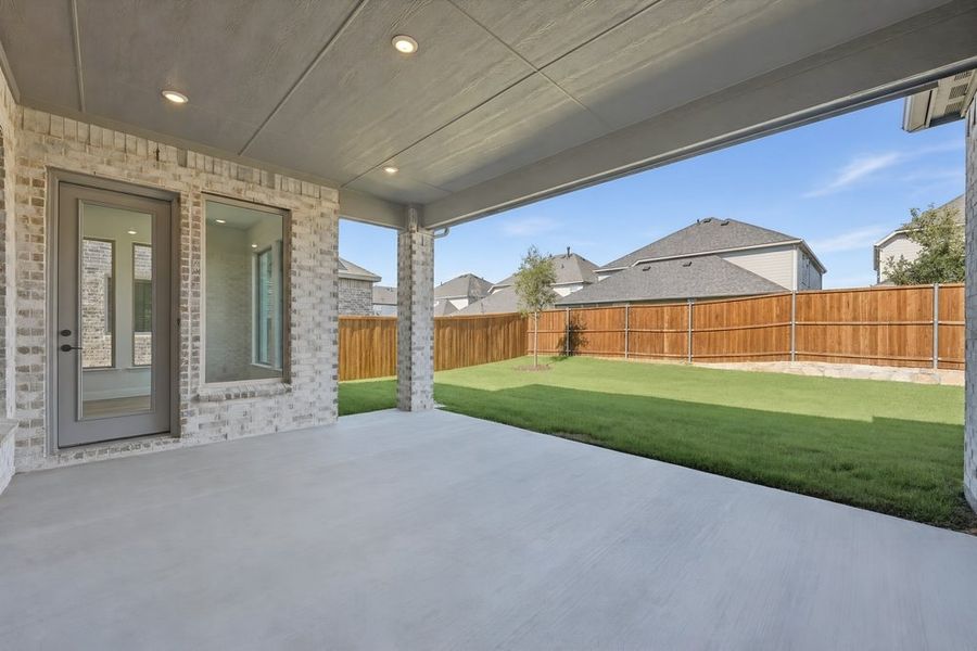 Exterior details and patio area of a home in South Oak, Lakewood Village (Image 2). Exterior details and patio area of a home in South Oak, Lakewood Village (Image 2).