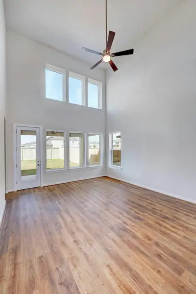 Representative unfurnished interior of a home built from the Travis by Scott Felder Homes in Flora, Hutto (Image 9).