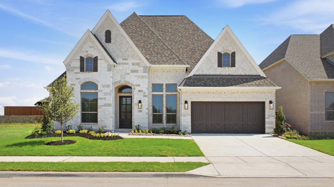 Front exterior of a new home in Mustang Lakes, Celina, TX, highlighting curb appeal (Image 1). Front exterior of a new home in Mustang Lakes, Celina, TX, highlighting curb appeal (Image 1).