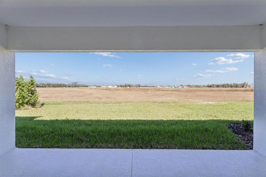 Exterior details and patio area of a home in Oakfield, Parrish (Image 4).