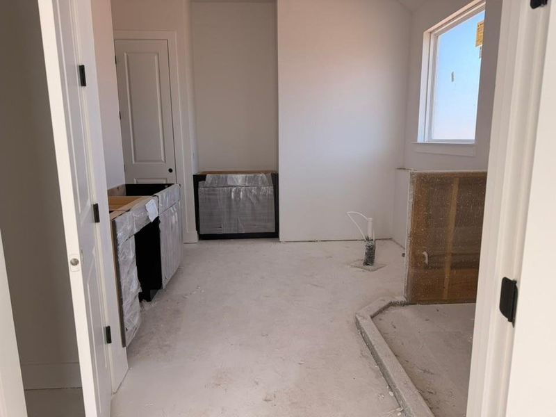 Bathroom with vanity and concrete flooring