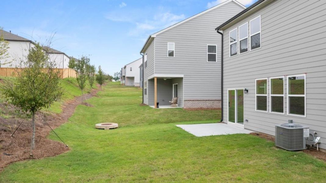 Exterior details and patio area of a home in Timber Ridge: Timber Ridge 42', Douglasville (Image 18).