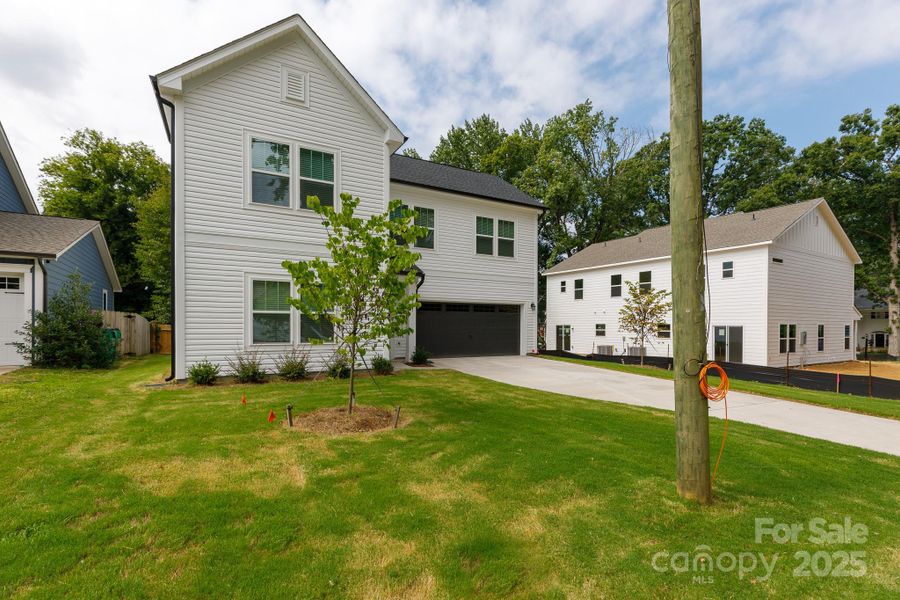 Front exterior of a new home in , Charlotte, NC, highlighting curb appeal (Image 20).
