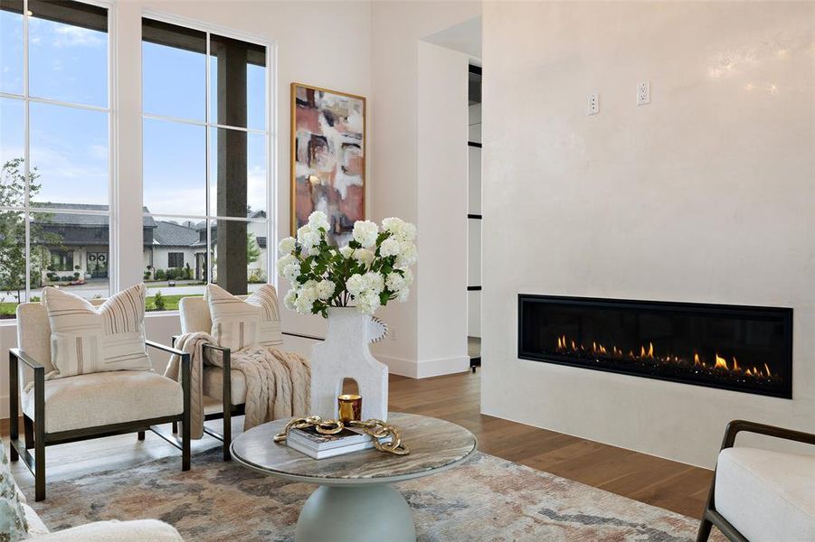 Venetian plaster two-sided fireplace off foyer and living room