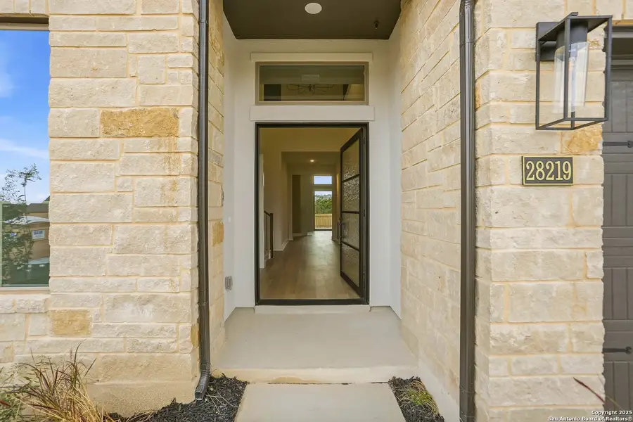 Exterior details and patio area of a home in Kinder Ranch 70's, San Antonio (Image 3).