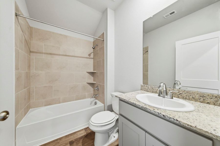 Furnished interior view inside a new home in Caney Mills, Conroe (Image 7).