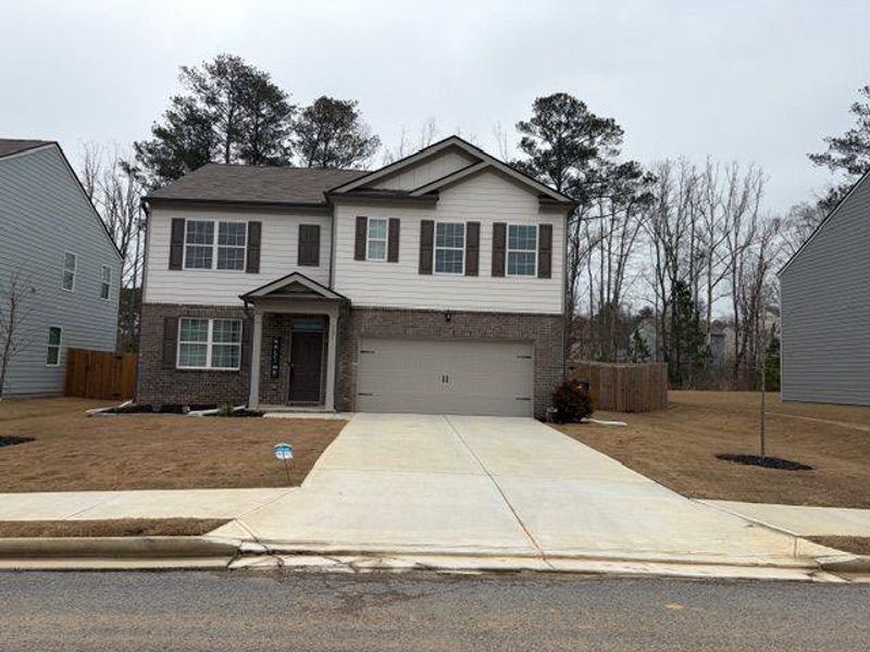 Front exterior of a new home in , Dallas, GA, highlighting curb appeal (Image 1). Front exterior of a new home in , Dallas, GA, highlighting curb appeal (Image 1).