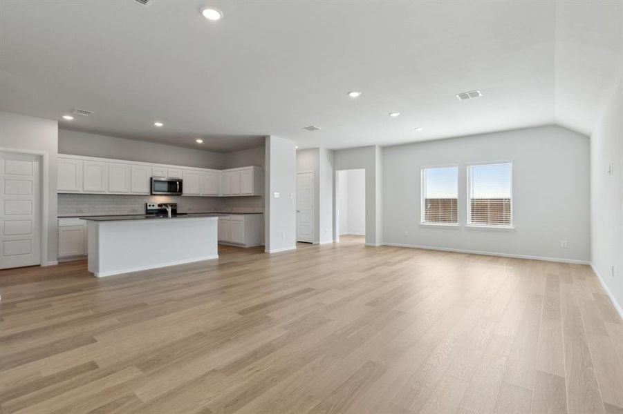 Open Floor Plan in the Hayden home plan by Trophy Signature Homes – REPRESENTATIVE PHOTO Open Floor Plan in the Hayden home plan by Trophy Signature Homes – REPRESENTATIVE PHOTO