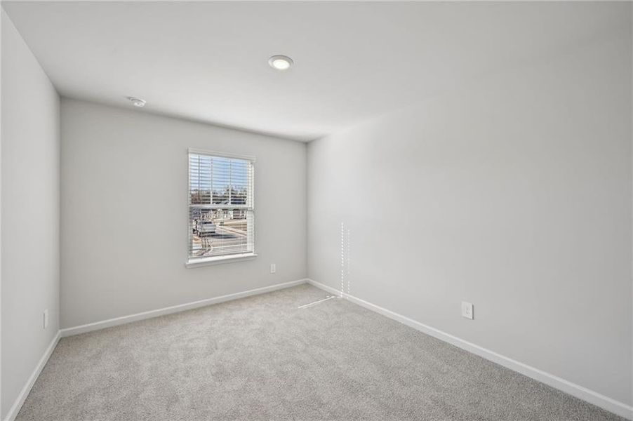 Spacious, unfurnished interior of a new home in Creekside at Oxford Park, Fairburn (Image 33).