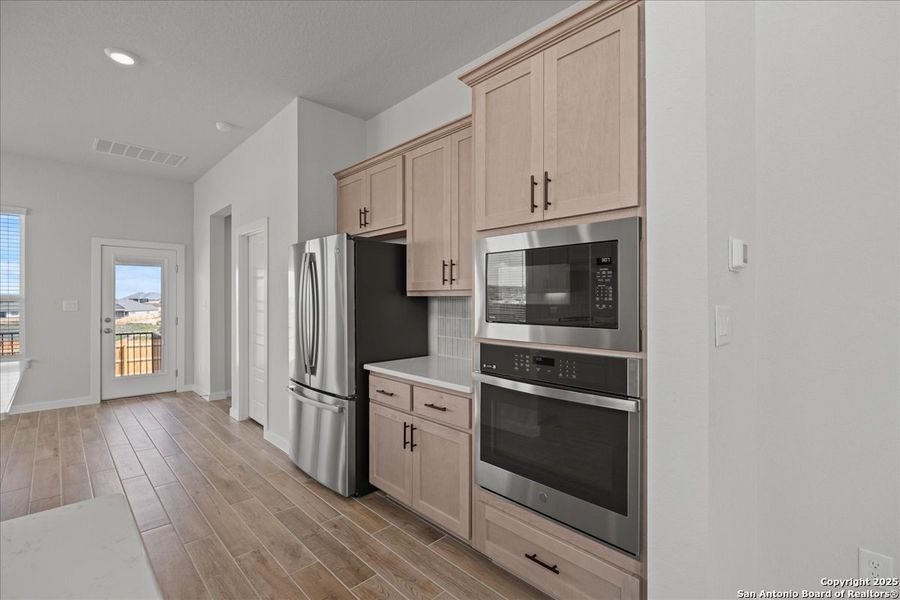 Furnished interior view inside a new home in Meyer Ranch, New Braunfels (Image 5).