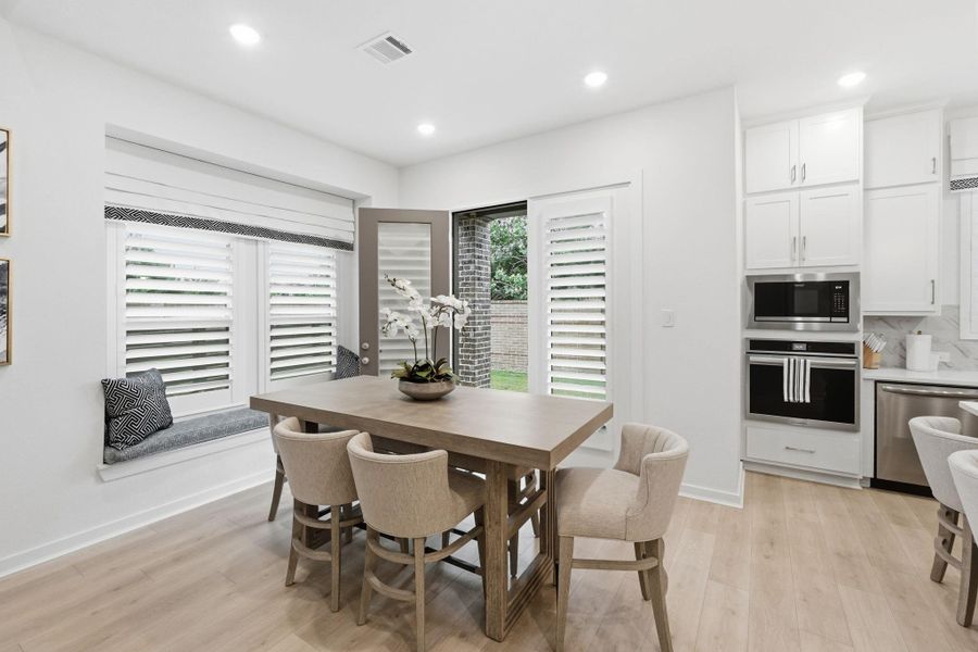 Furnished interior view inside a new home in Bridgeland Central, Cypress (Image 12).