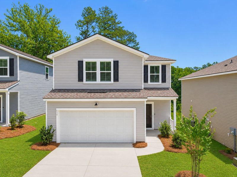 Front exterior of a new home in Grand Arbor, Blythewood, SC, highlighting curb appeal (Image 20).