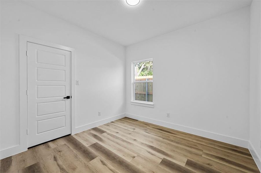 Spare room featuring light hardwood / wood-style flooring