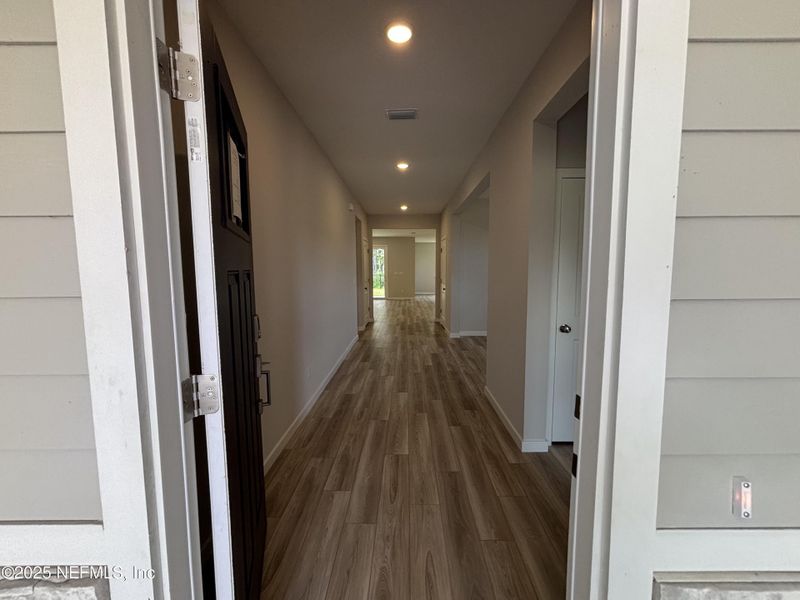 Furnished interior view inside a new home in The Cypress Series at Reserve East, Flagler Beach (Image 6).