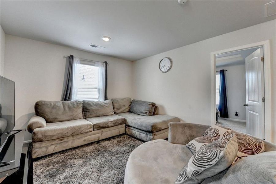 Furnished interior view inside a new home in Adagio, Dacula (Image 35).